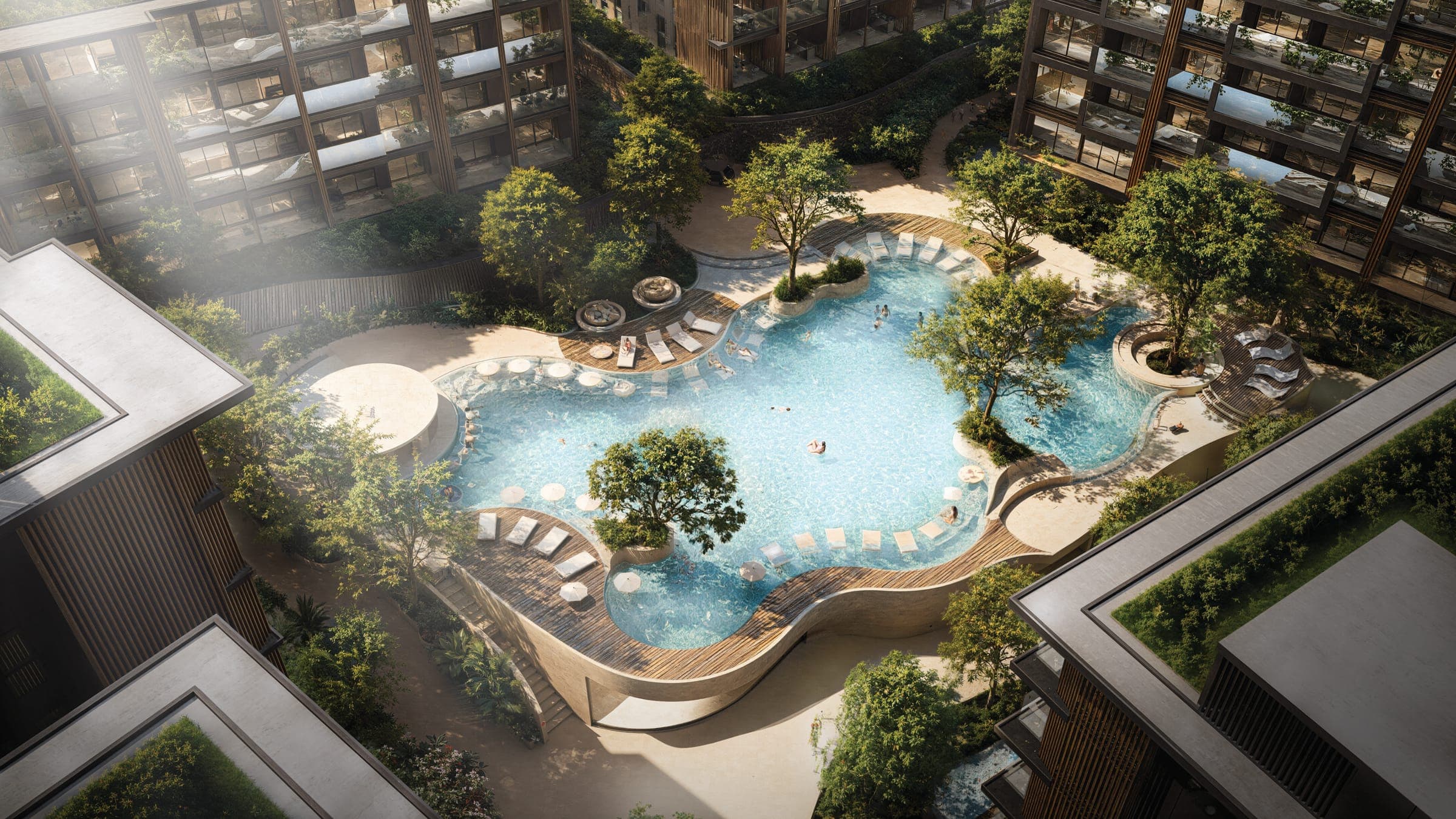 Aerial render of the free-form pool and decking among the Ascott Abov Patong buildings