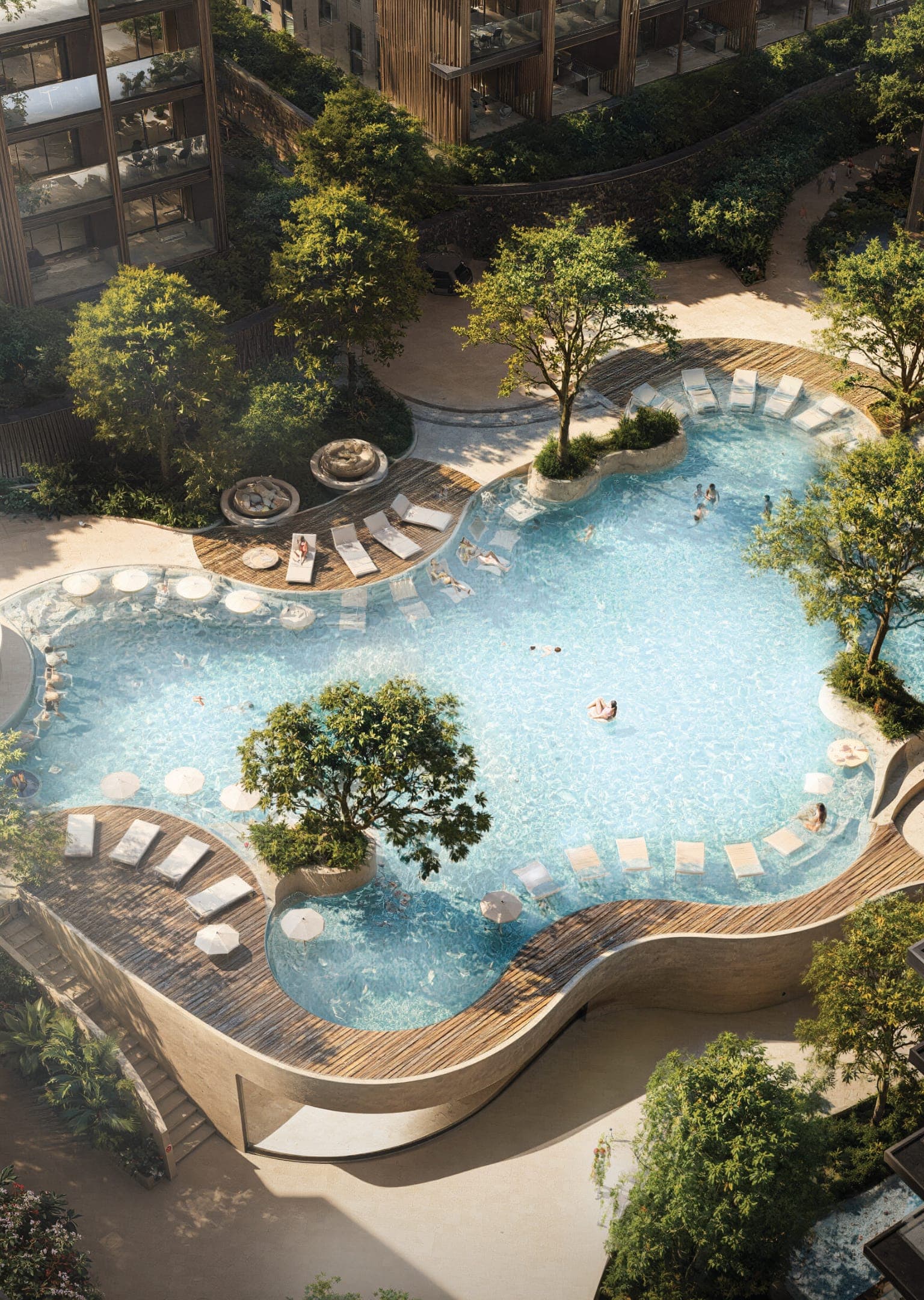Free-form pool with loungers and island trees