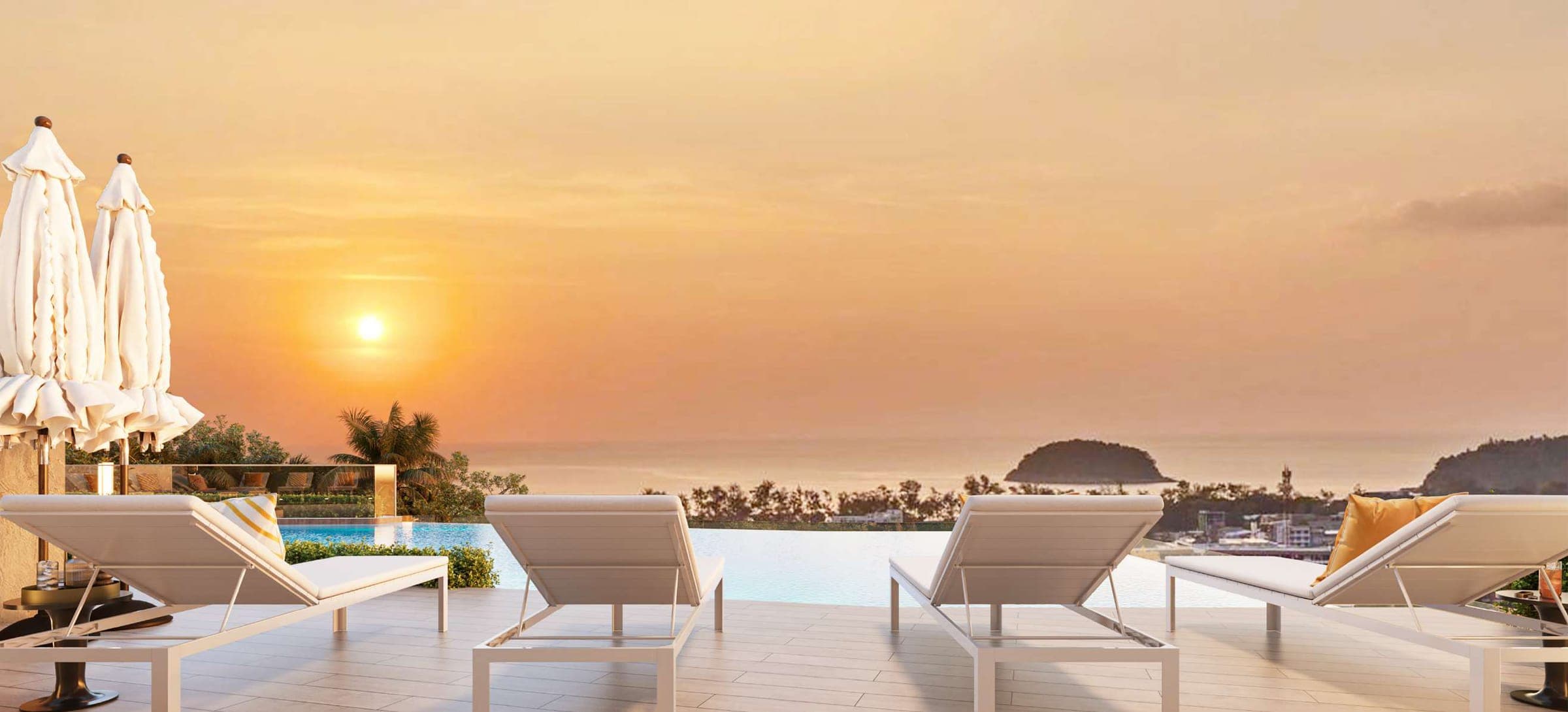 Sun loungers at sunset overlooking the bay