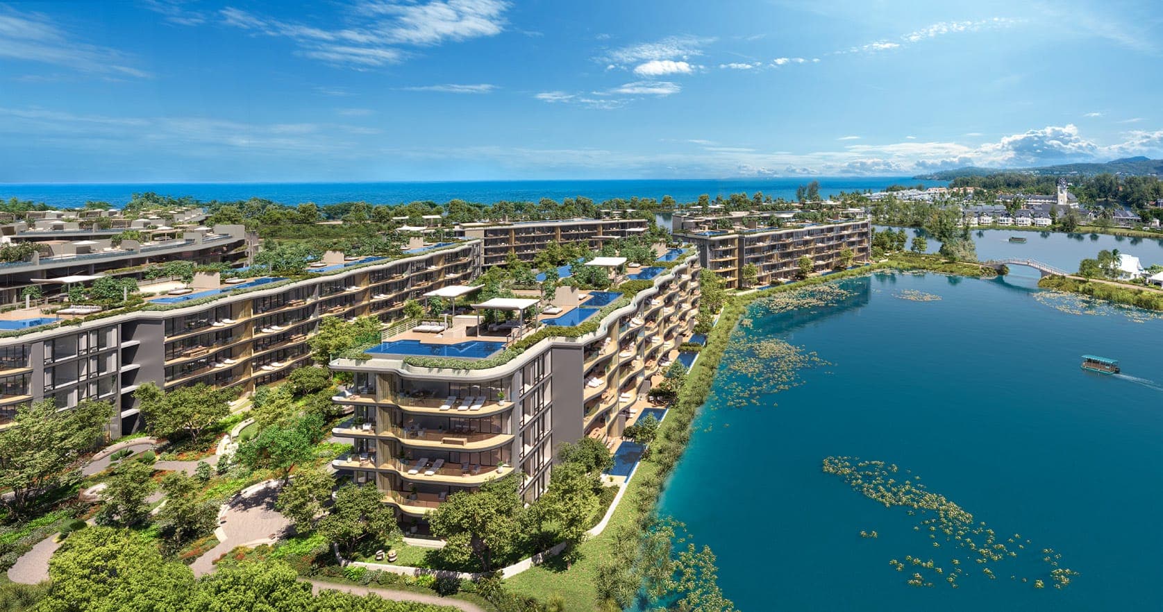 Aerial view of Bellaguna Lake Residences with rooftop pools beside the lagoon