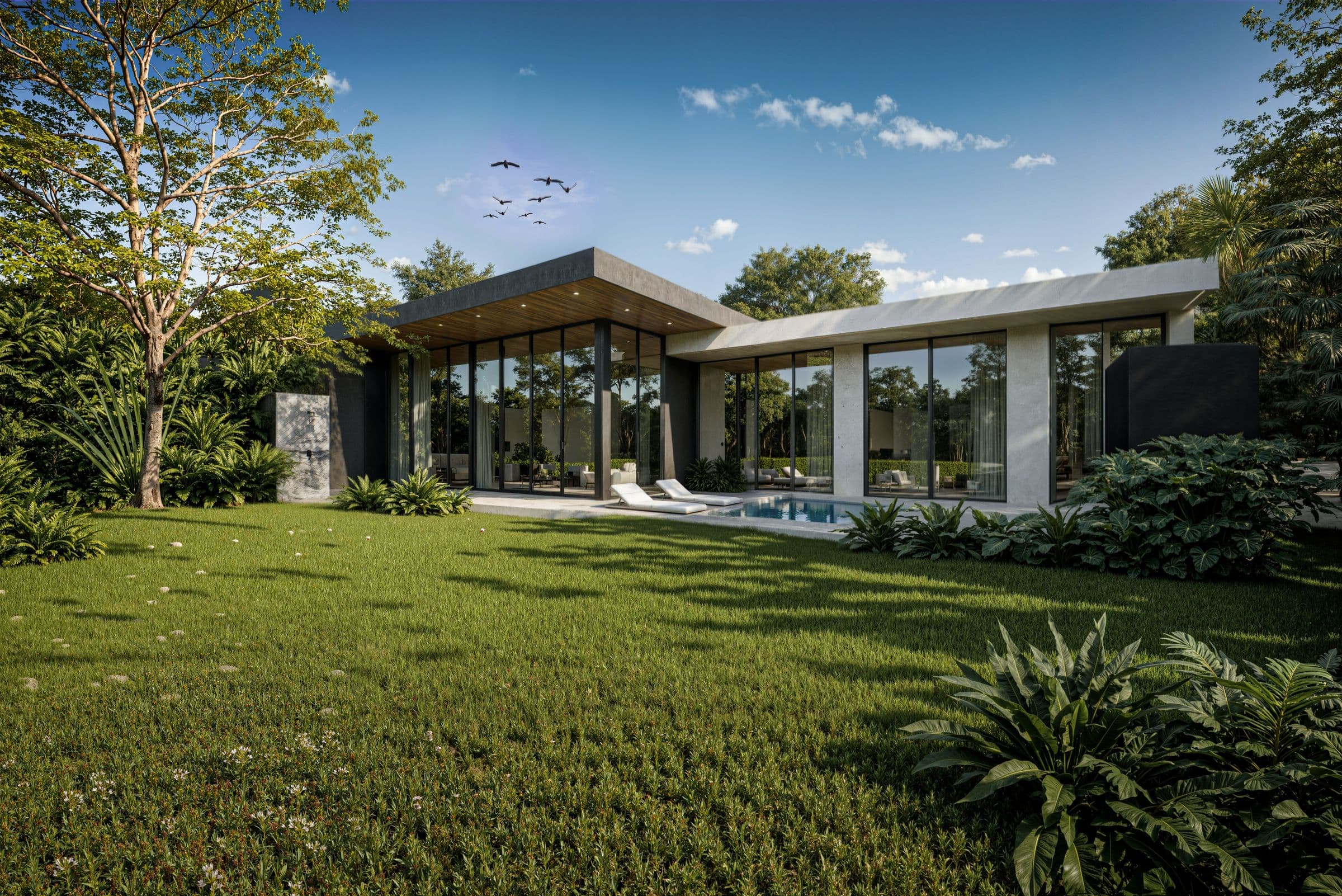 Enigma Villa Naiharn pool villa with full-height glazing, lawn and pool