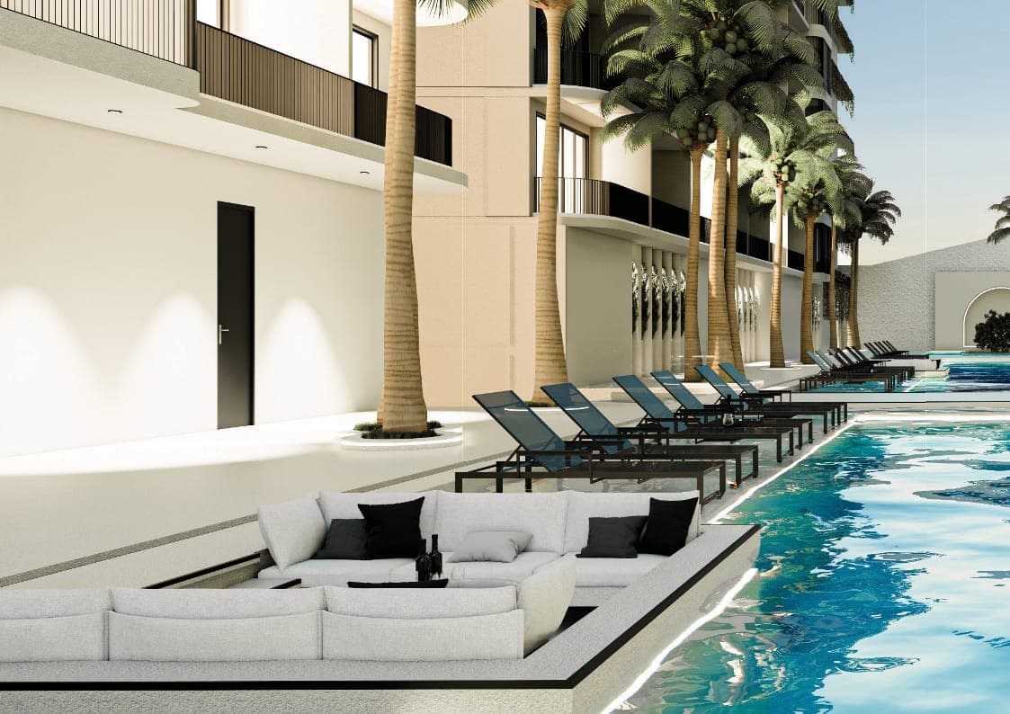 Lap pool deck with palms and sunken lounge