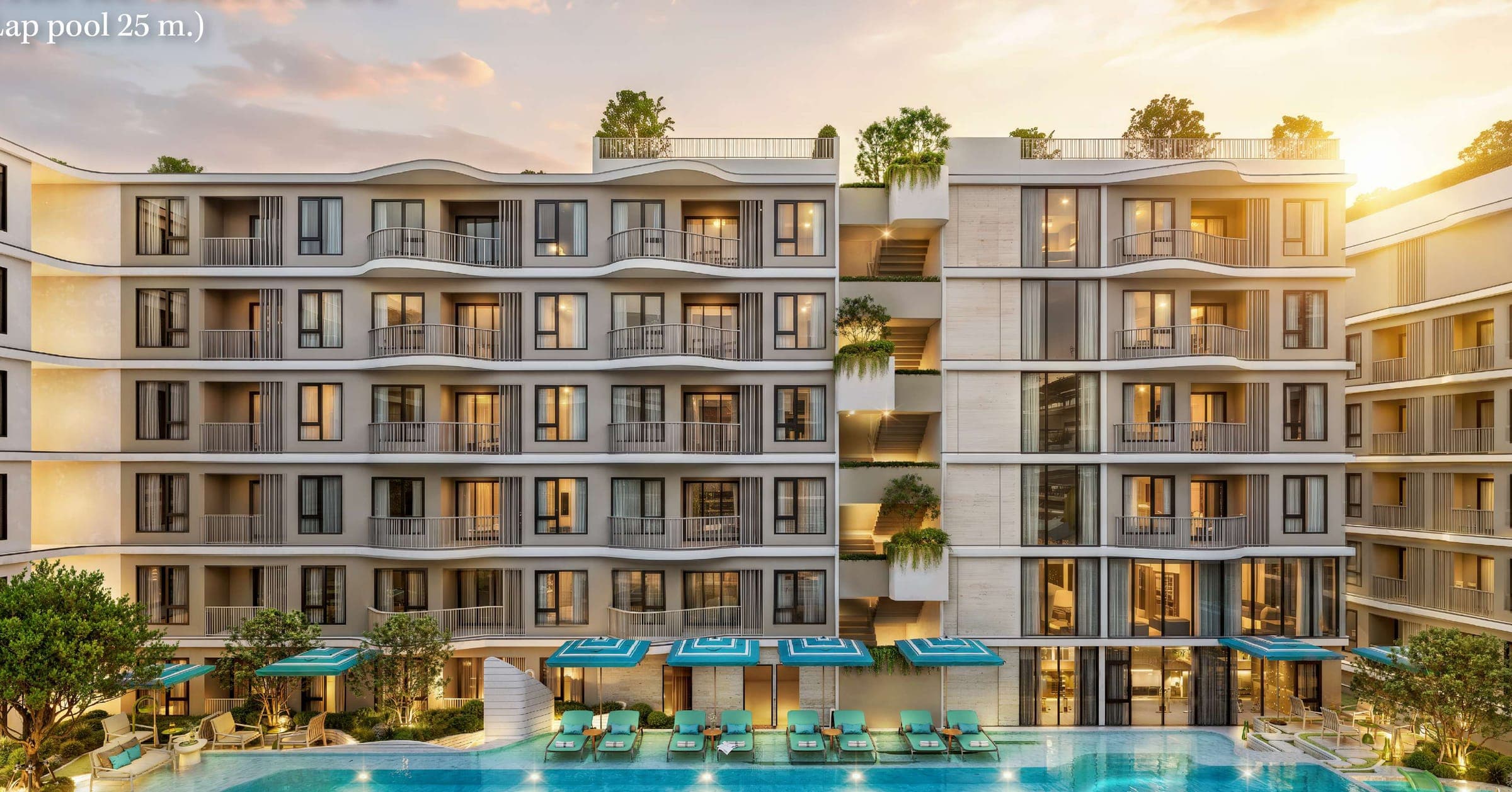 The Kuartz courtyard pool framed by curving balconies at dusk