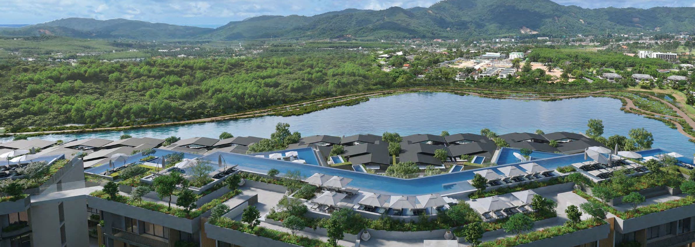 Lake view over landscaped rooftops and pools