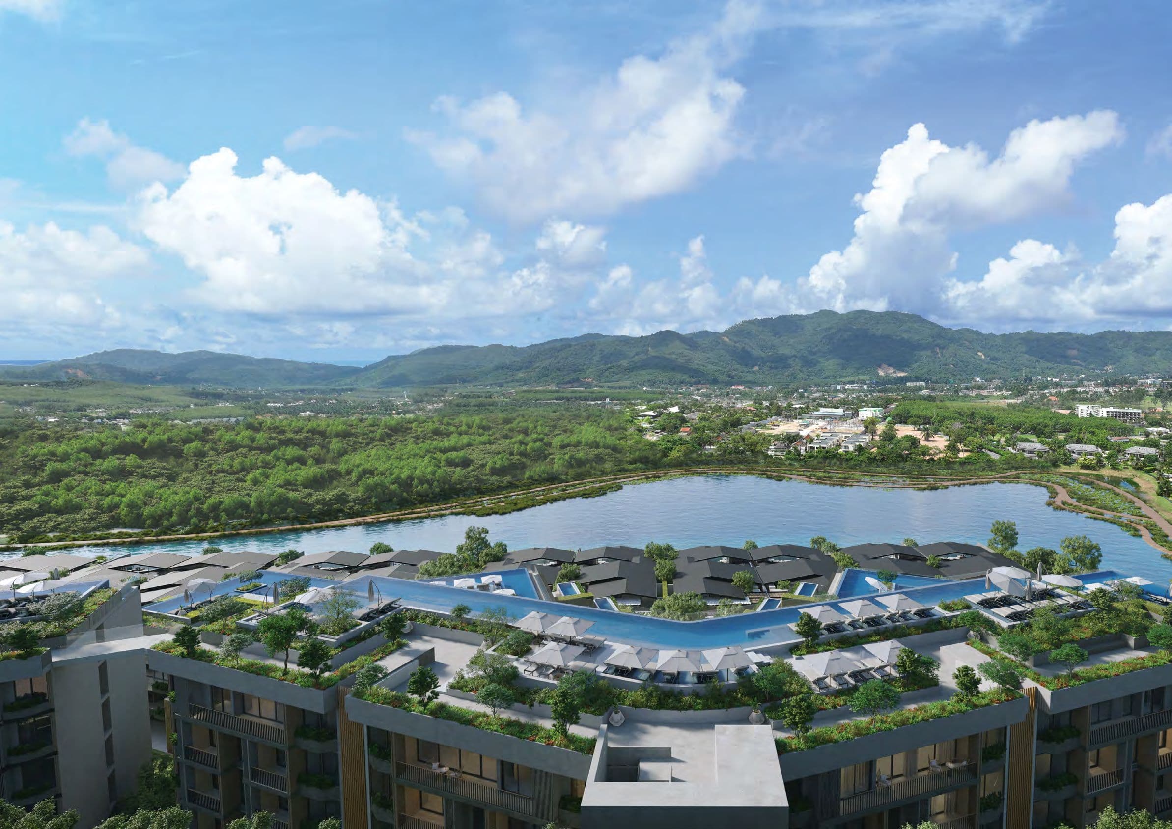 View across the rooftops to the lake and hills