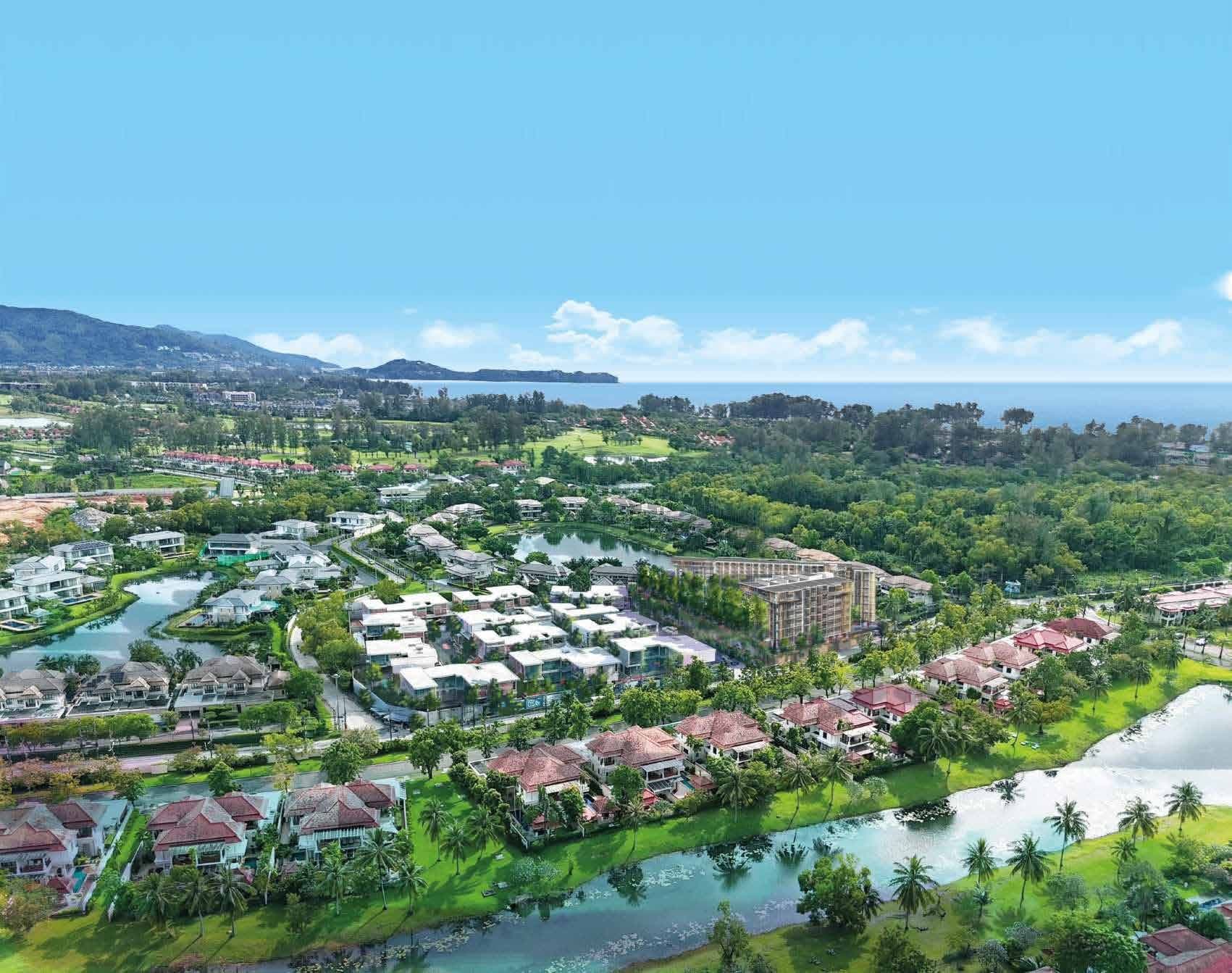 Aerial render of the site among lagoons and greenery, with Bang Tao Bay beyond