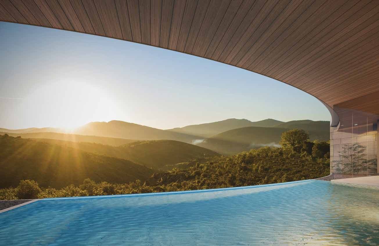 Pool edge facing the sunrise over the hills