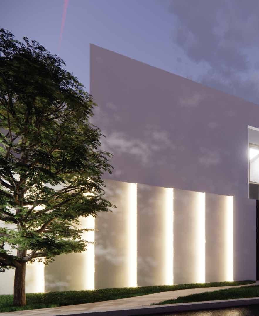 Lit entrance wall at dusk