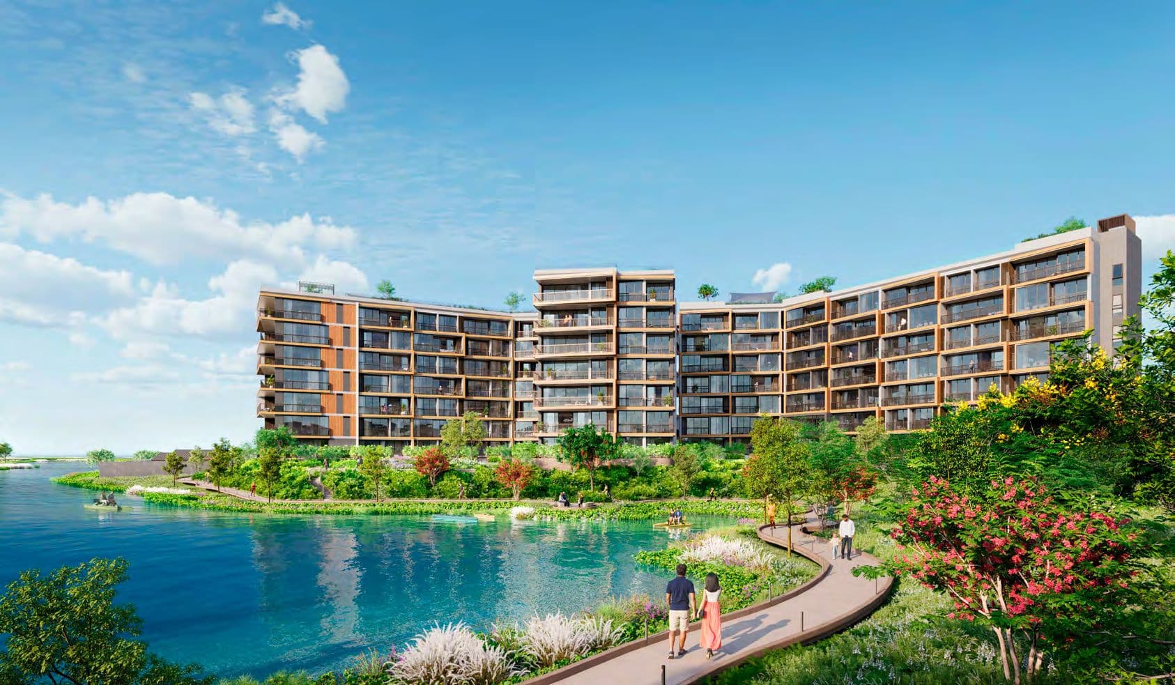 Skypark Elara rising above a lagoon and landscaped waterside walk