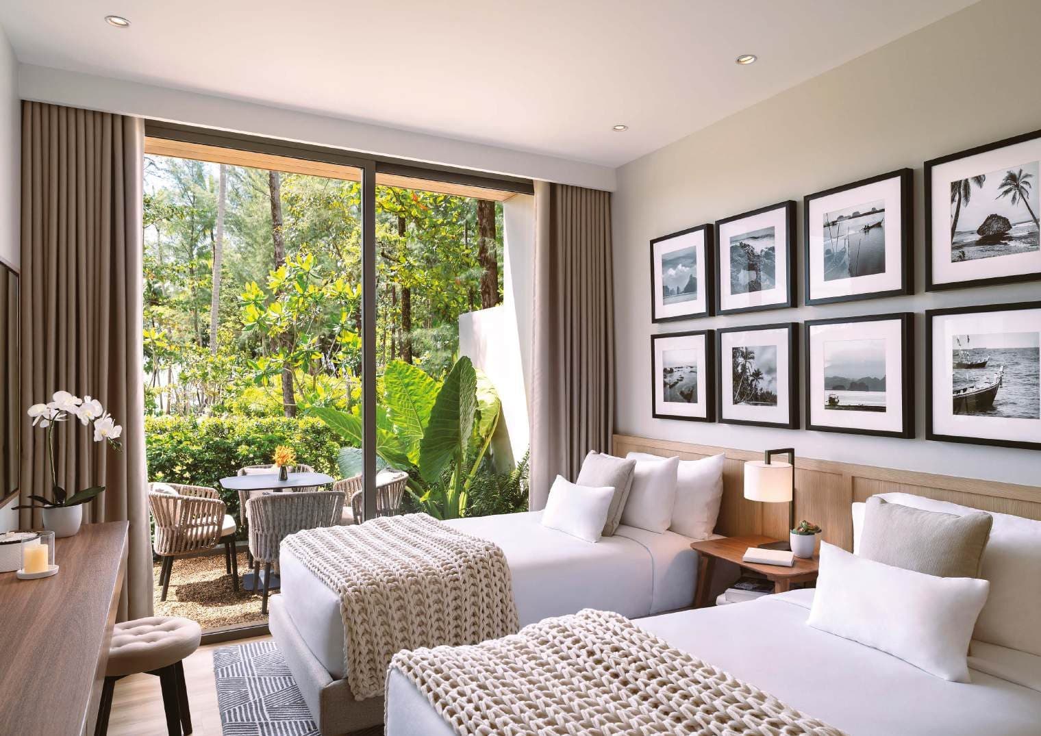 Twin bedroom opening to a garden terrace