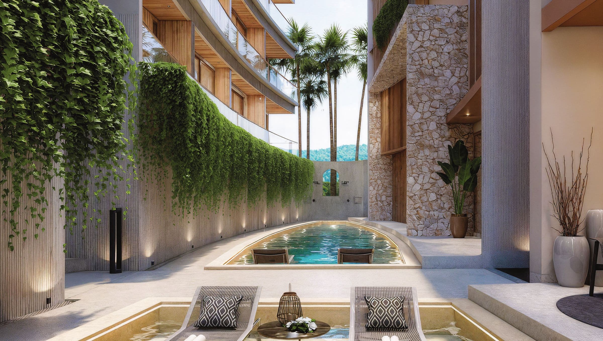 Courtyard pool with loungers between the buildings