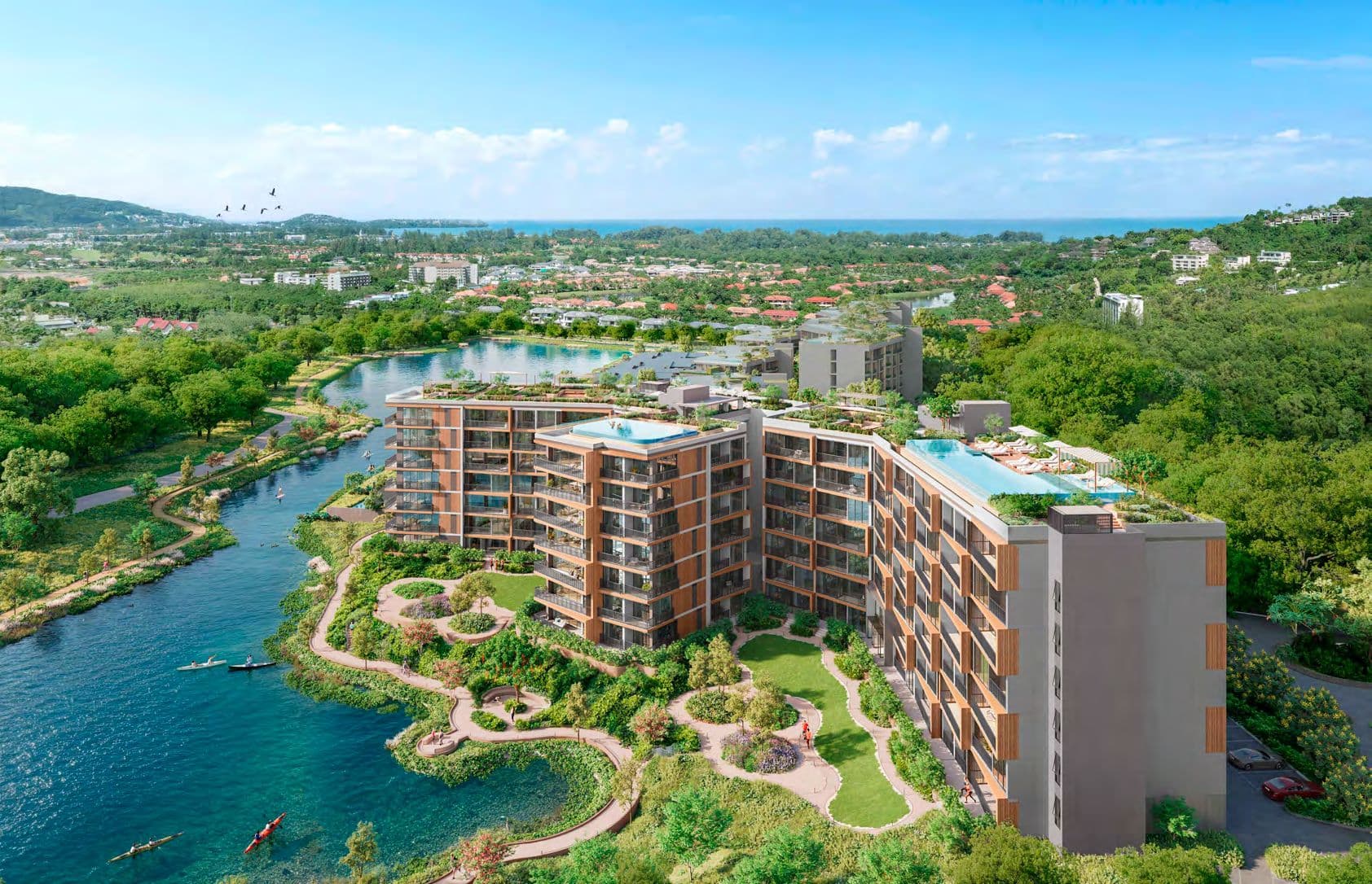 Aerial view of Skypark Elara beside winding lagoons and gardens