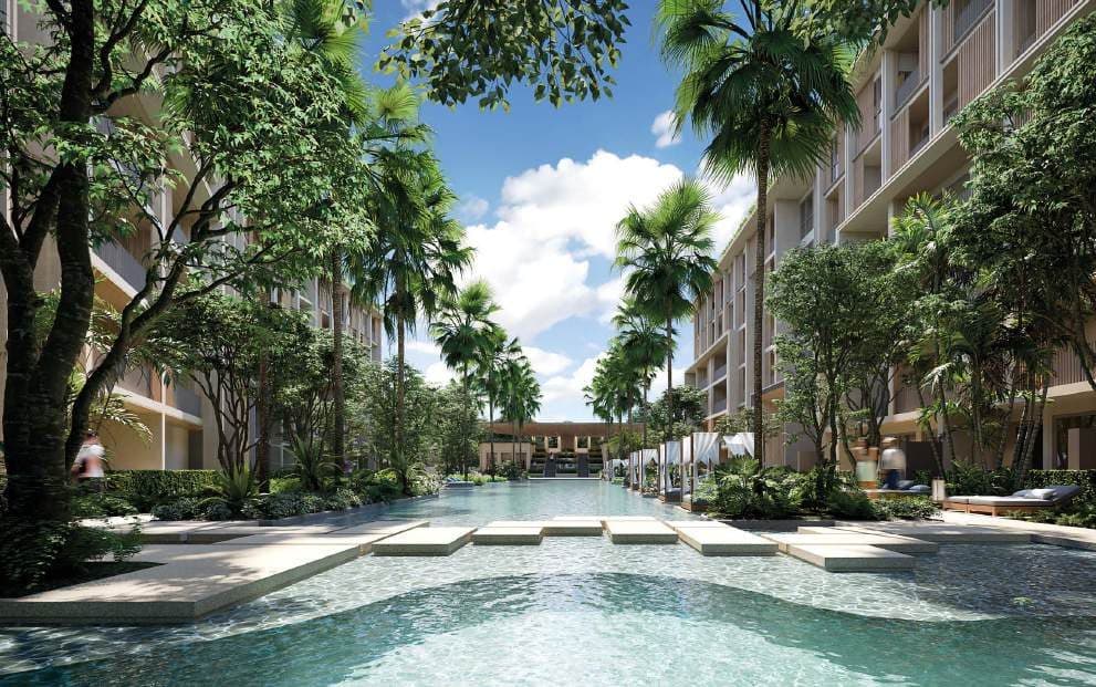 Lagoon-style pool with stepping stones between the residential buildings