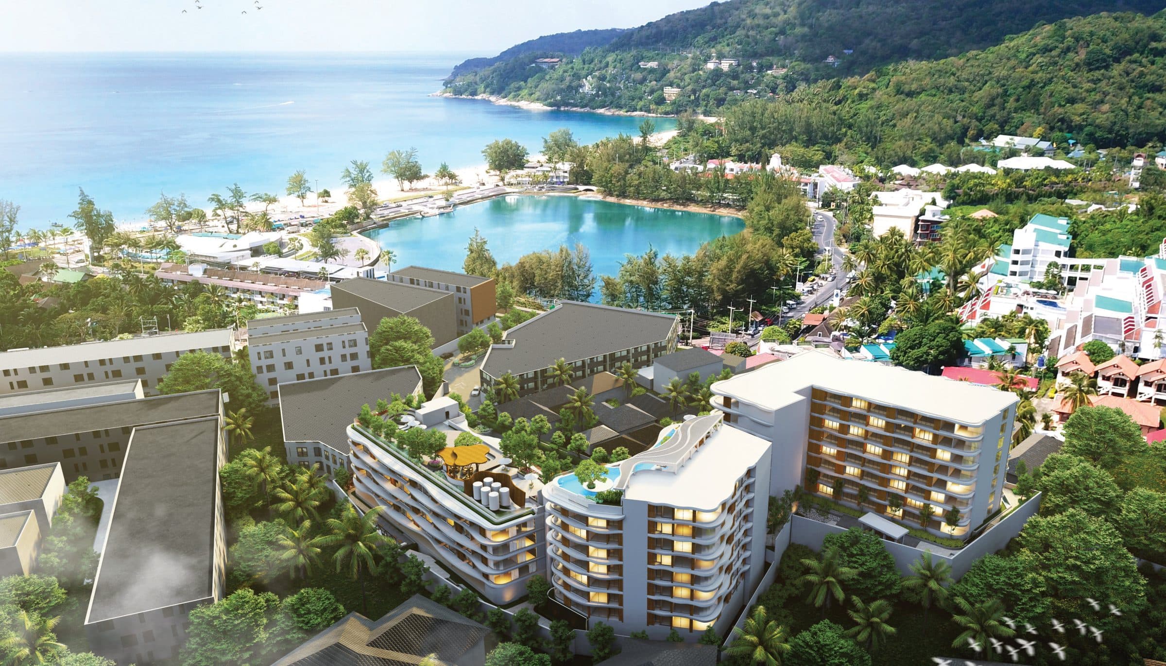 Aerial view of Vibe Residence with Karon's lake, beach and green headland beyond